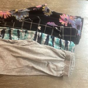 3 pairs Justice leggings. One pair Lee’s
